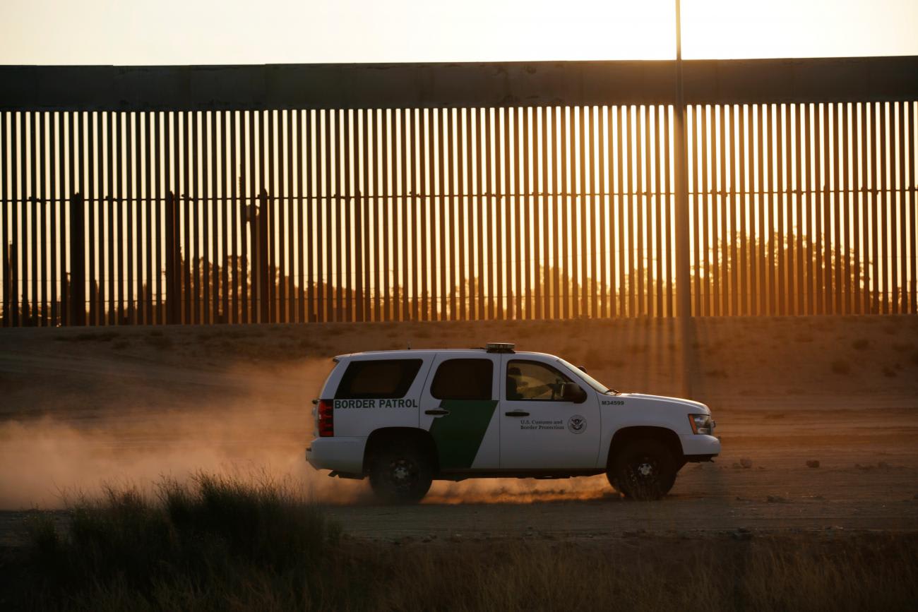 A white SUV of U.S. Customs and Border Protection (CBP) patrols along a new section of the border wall in El Paso, Texas, U.S., as seen from Ciudad Juarez, Mexico August 27, 2020.