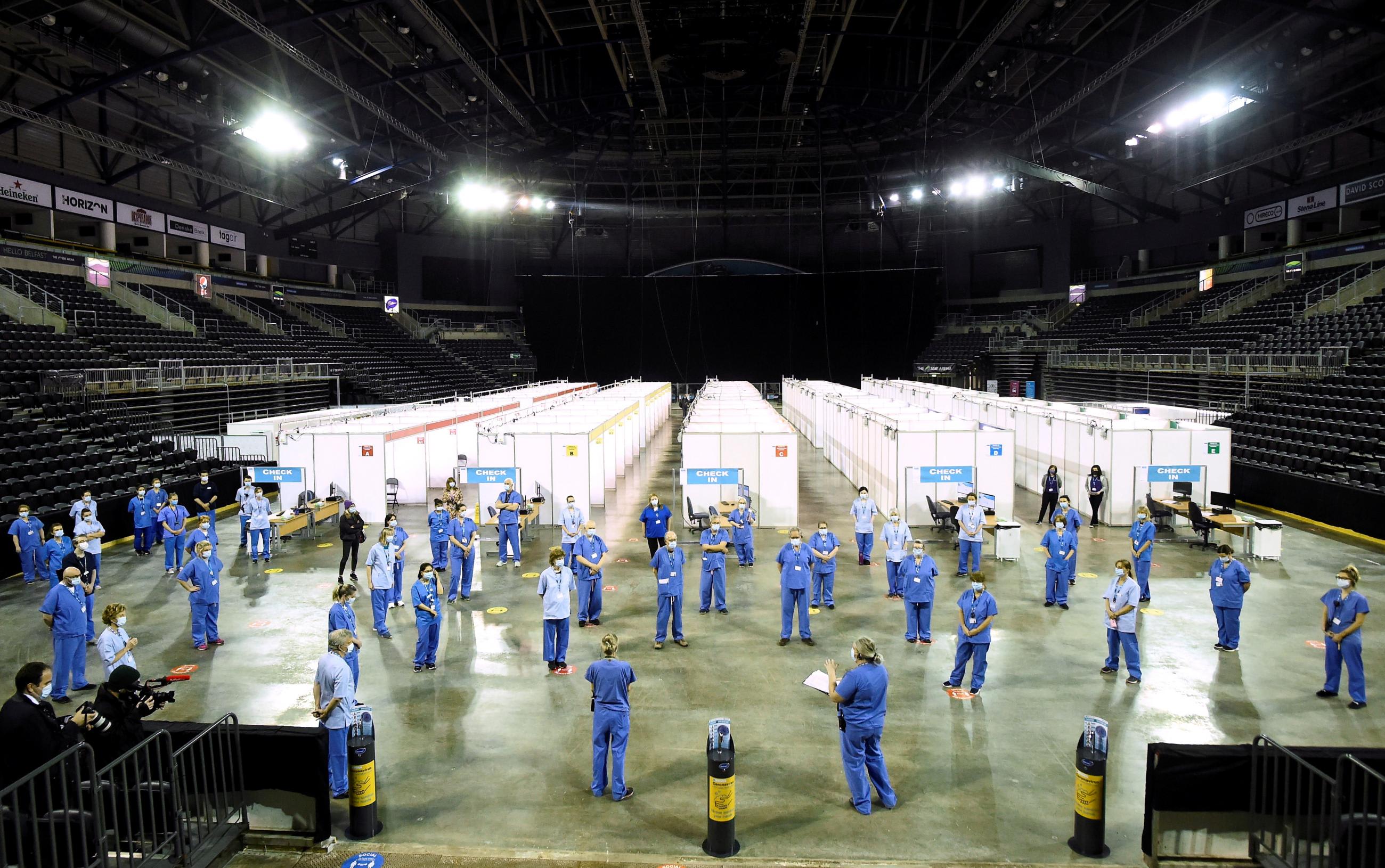 Medical staff prepare for administering the AstraZeneca COVID-19 vaccine at the SSE Arena which opened this morning and will operate as a mega regional vaccination centre in Belfast, Northern Ireland March 29, 2021.