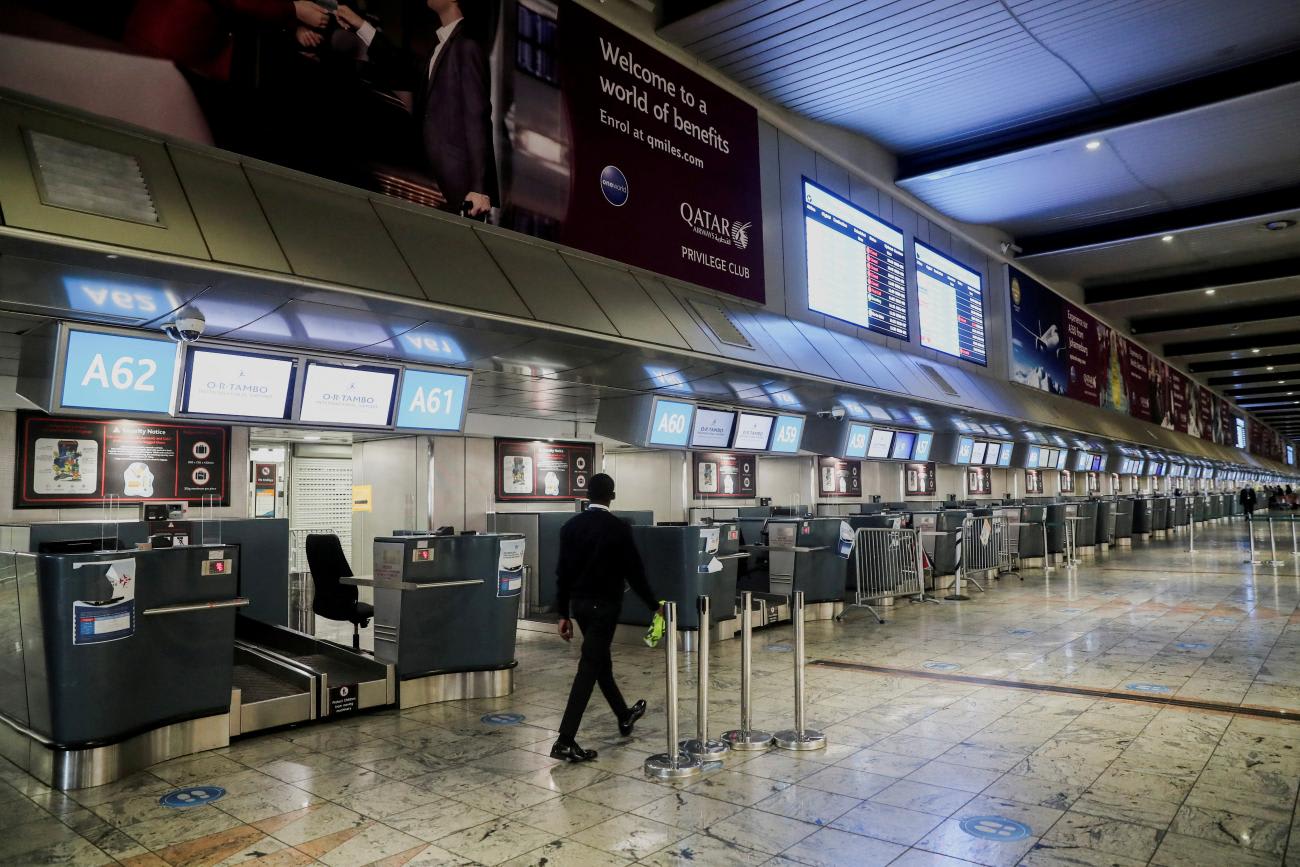 Check-in counters stand empty as several airlines stopped flying out of South Africa, amidst the spread of the omicron variant, at O.R. Tambo International Airport in Johannesburg, South Africa.