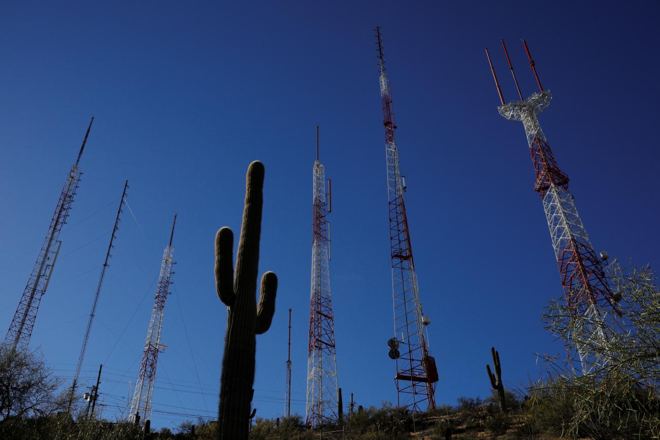 A cactus stands alongside antennas on top of South Mountain in the Maricopa County city of Phoenix, Arizona, on May 25, 2019.