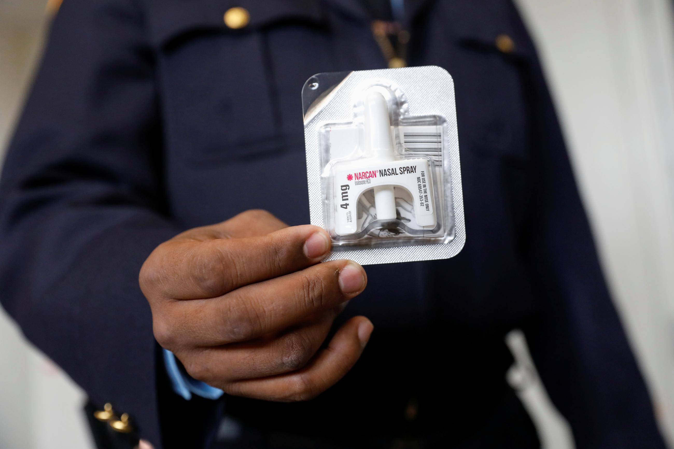 Corrections officer Anthony Willingham displays Naloxone nasal spray, part of an opioid anti-overdose medicine kit for inmates to take with them upon release, before a training session for inmates at the Queensboro Correctional Facility in Queens, New York, U.S., April 9, 2018.