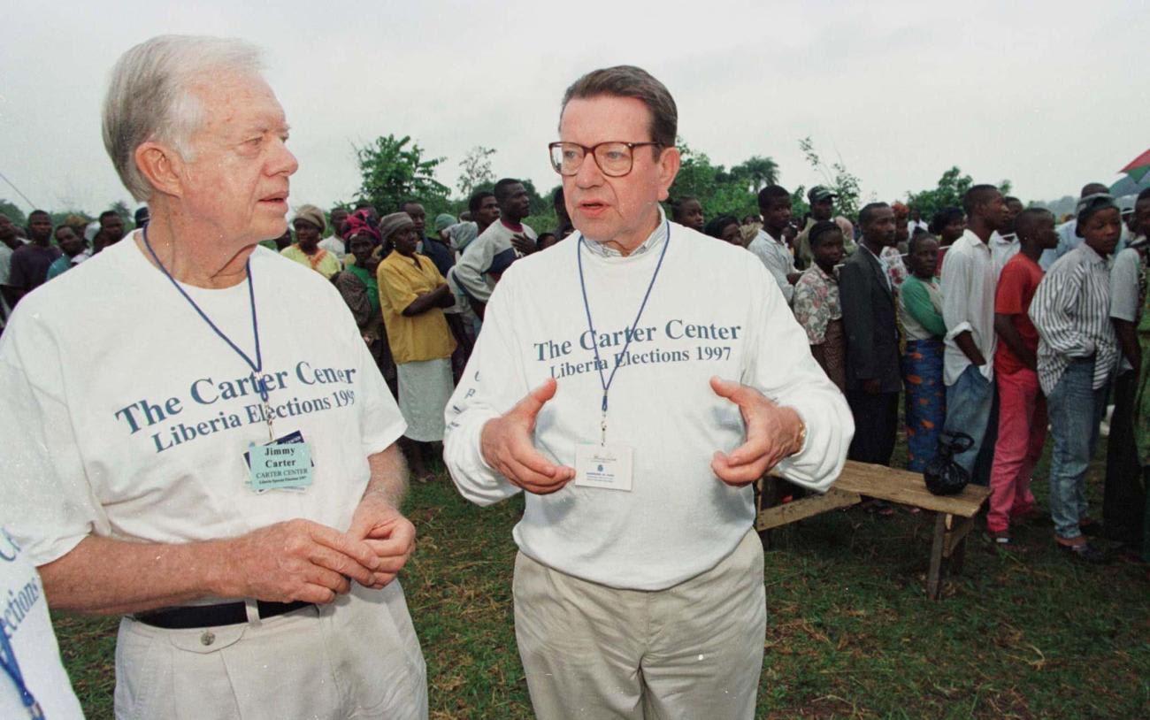 Former U.S. Senator Paul Simon with President Jimmy Carter in Monrovia, on July 19, 1997.