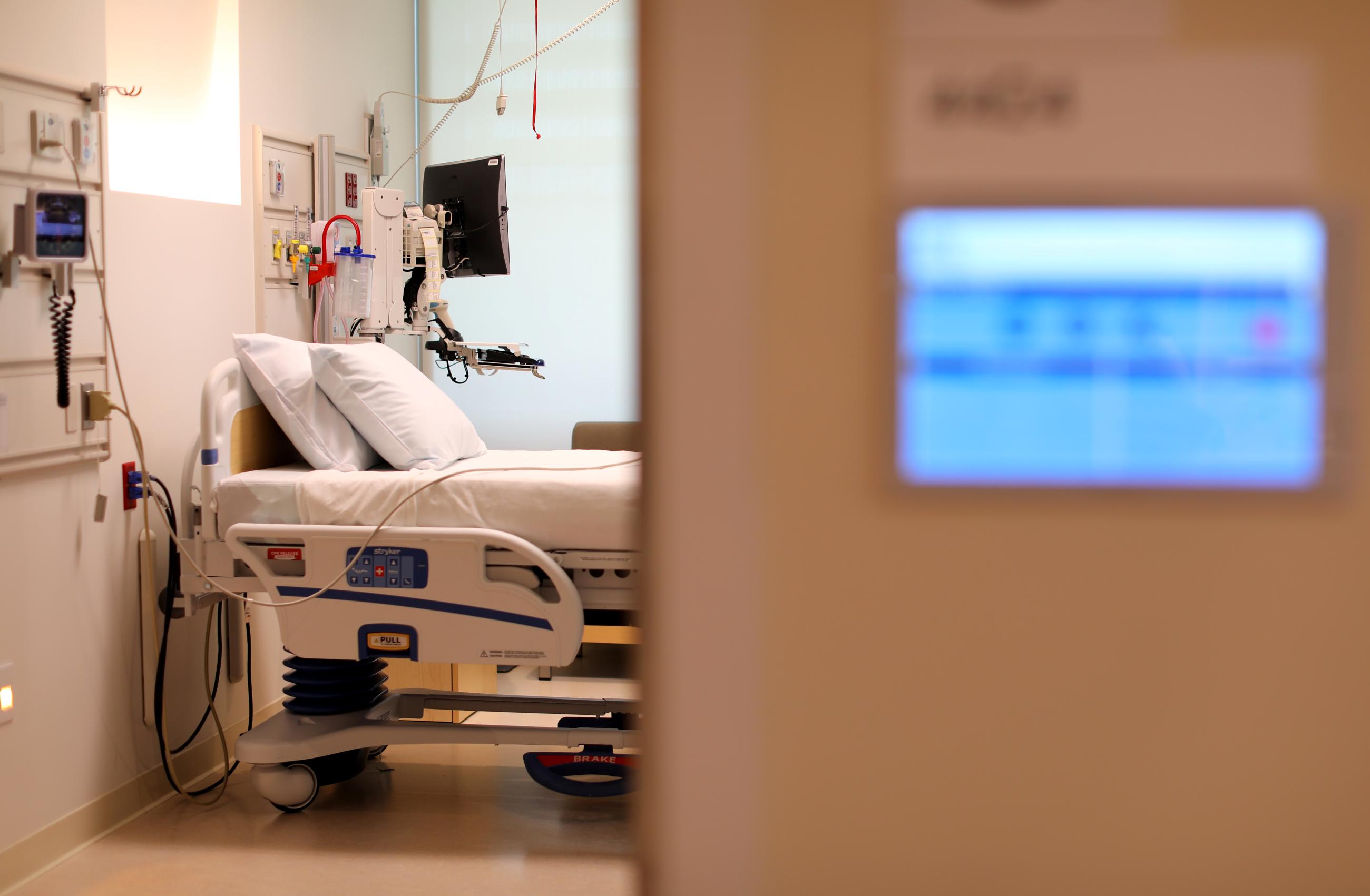 A patient's chart is shown on the wall to a hospital room at Kaiser Permanente San Diego Medical Center hospital, in San Diego, California, on April 17, 2017.