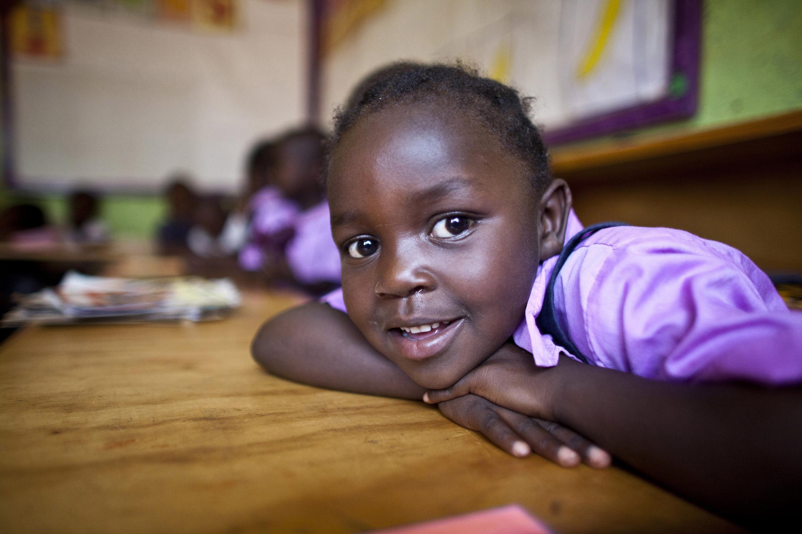 Stacey Musimbi, a deaf student, sits inside her classroom in the specialized deaf unit program at the Little Rock Inclusive Early Childhood Development Center, in Nairobi, Kenya, on March 15, 2012.