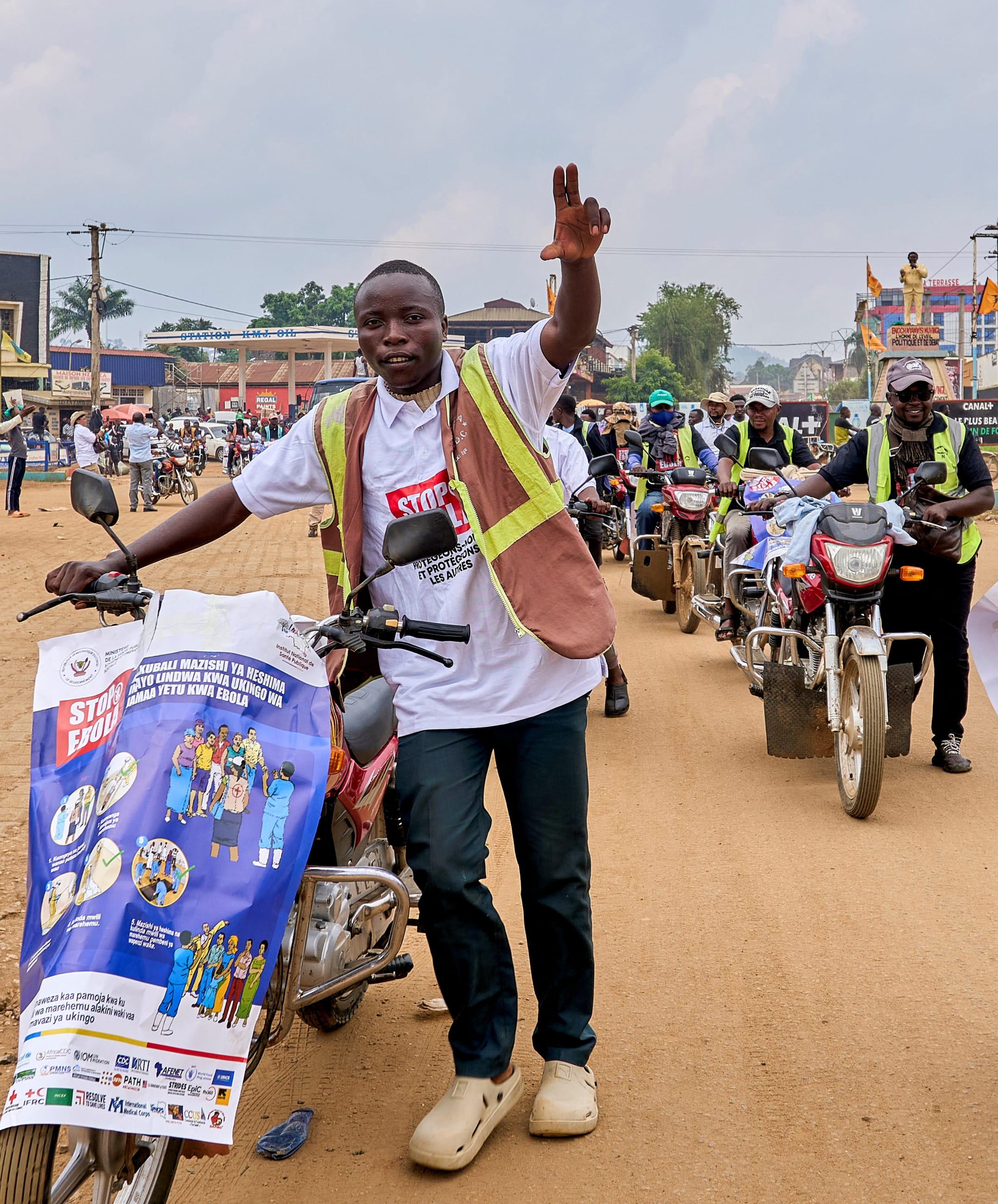 A motorcycle taxi operator gestures during the launch of an Ebola awareness caravan to encourage residents to follow preventive measures as authorities seek to prevent a resurgence of the virus in Beni, North Kivu Province, Democratic Republic of the Congo, on August 5, 2026.