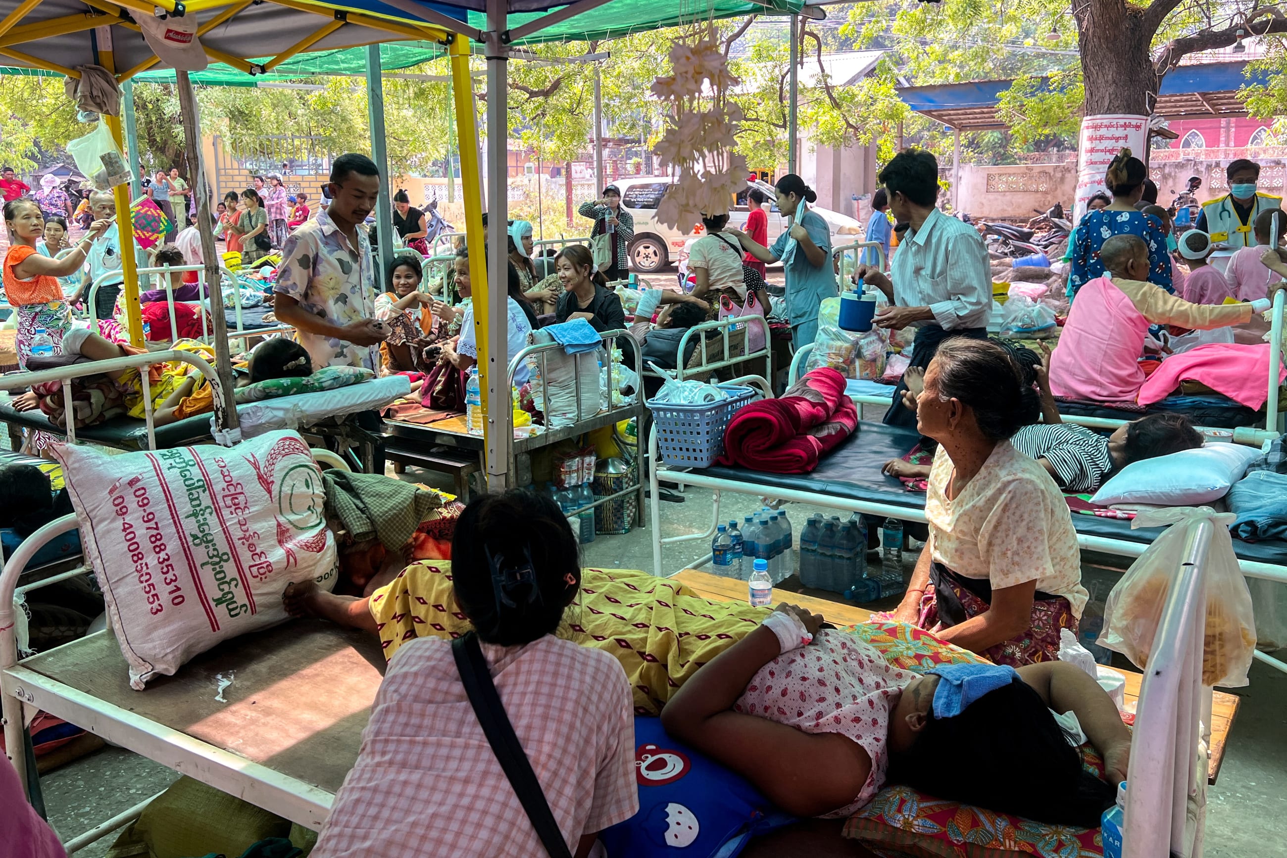 Patients lie on beds inside the compound of Sagaing Hospital, following a strong earthquake, in Sagaing, Myanmar, on April 2, 2025.