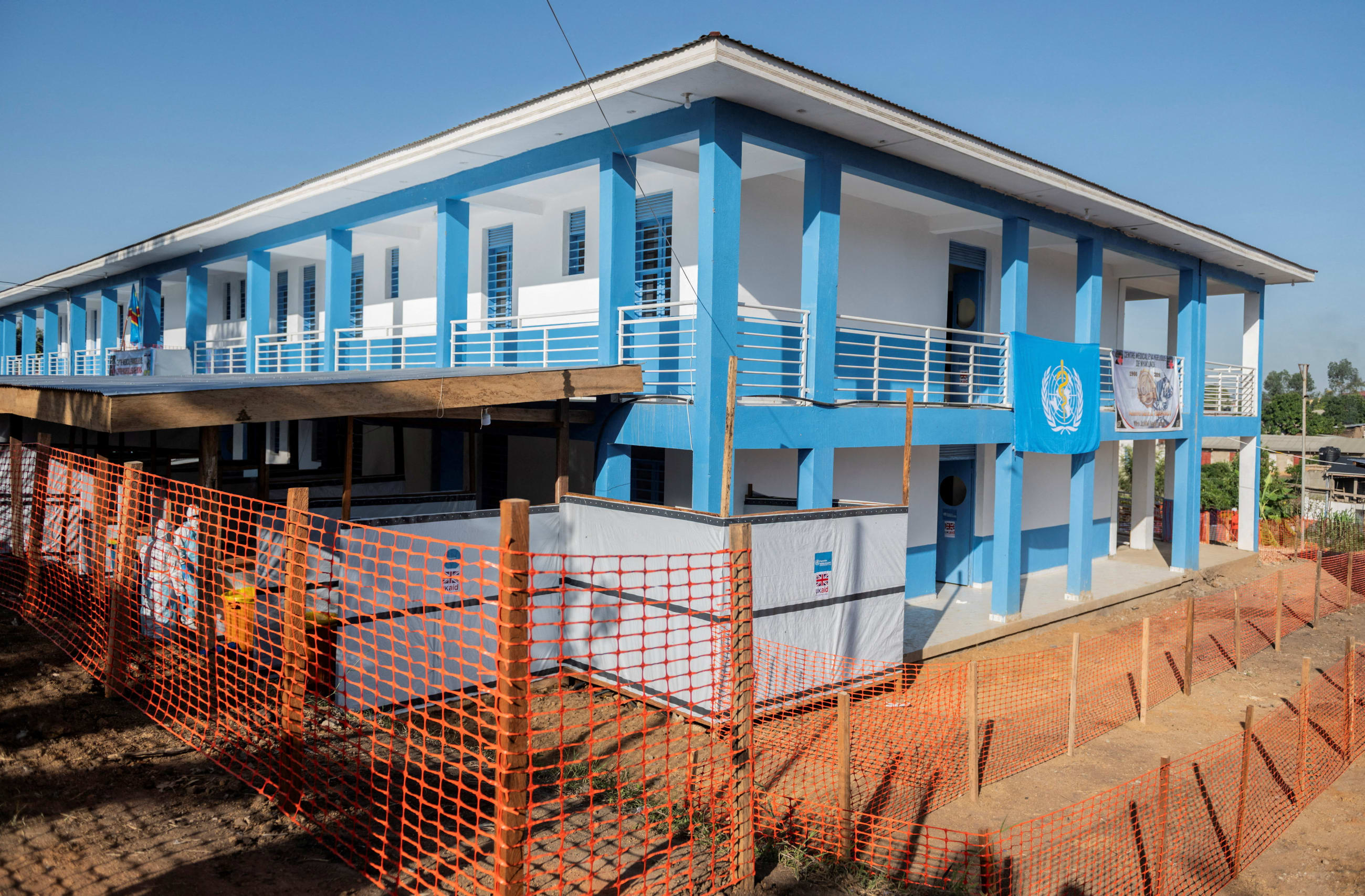Health workers walk at the Evangelical Medical Center (CEM), one of the facilities at the forefront of the response to the Ebola outbreak, in Bunia, Ituri province, Democratic Republic of Congo, on May 31, 2026.