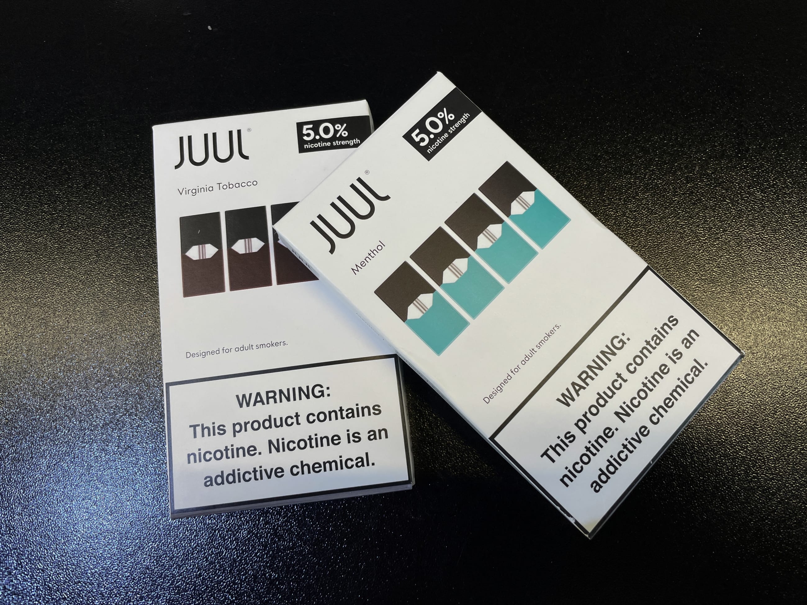 Juul e-cigarettes are seen on the counter of a vape store, in Santa Monica, California, on June 23, 2022.
