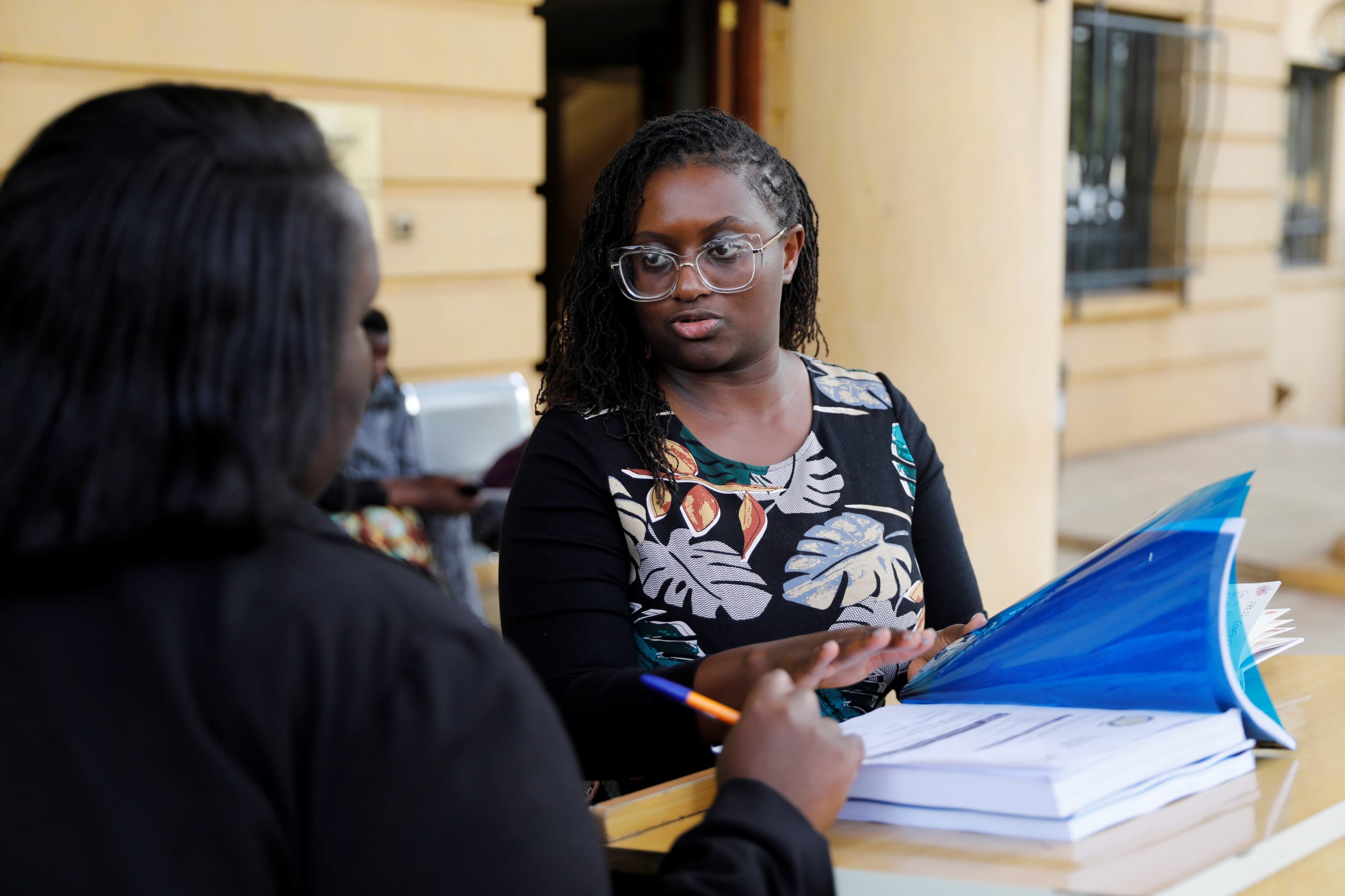 Mercy Mutemi, a lawyer representing a former content moderator, goes through documents before a news conference after filing a lawsuit against Facebook owner Meta Platforms Inc and its local content moderation contractor Sama, at the Milimani Law Courts, in Nairobi, Kenya, on May 10, 2022.
