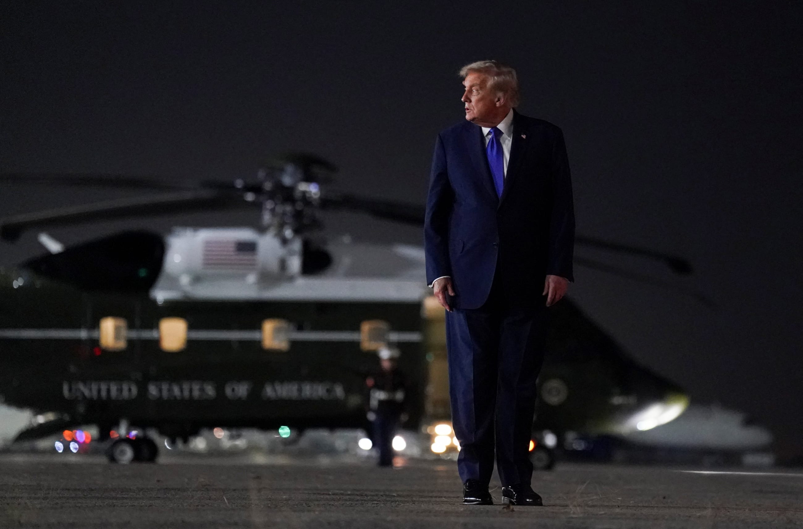 U.S. President Donald Trump looks on as he walks to board Air Force One, after attending the 80th United Nations General Assembly, at John F. Kennedy International Airport, in New York, U.S., September 23, 2025. REUTERS/Al Drago