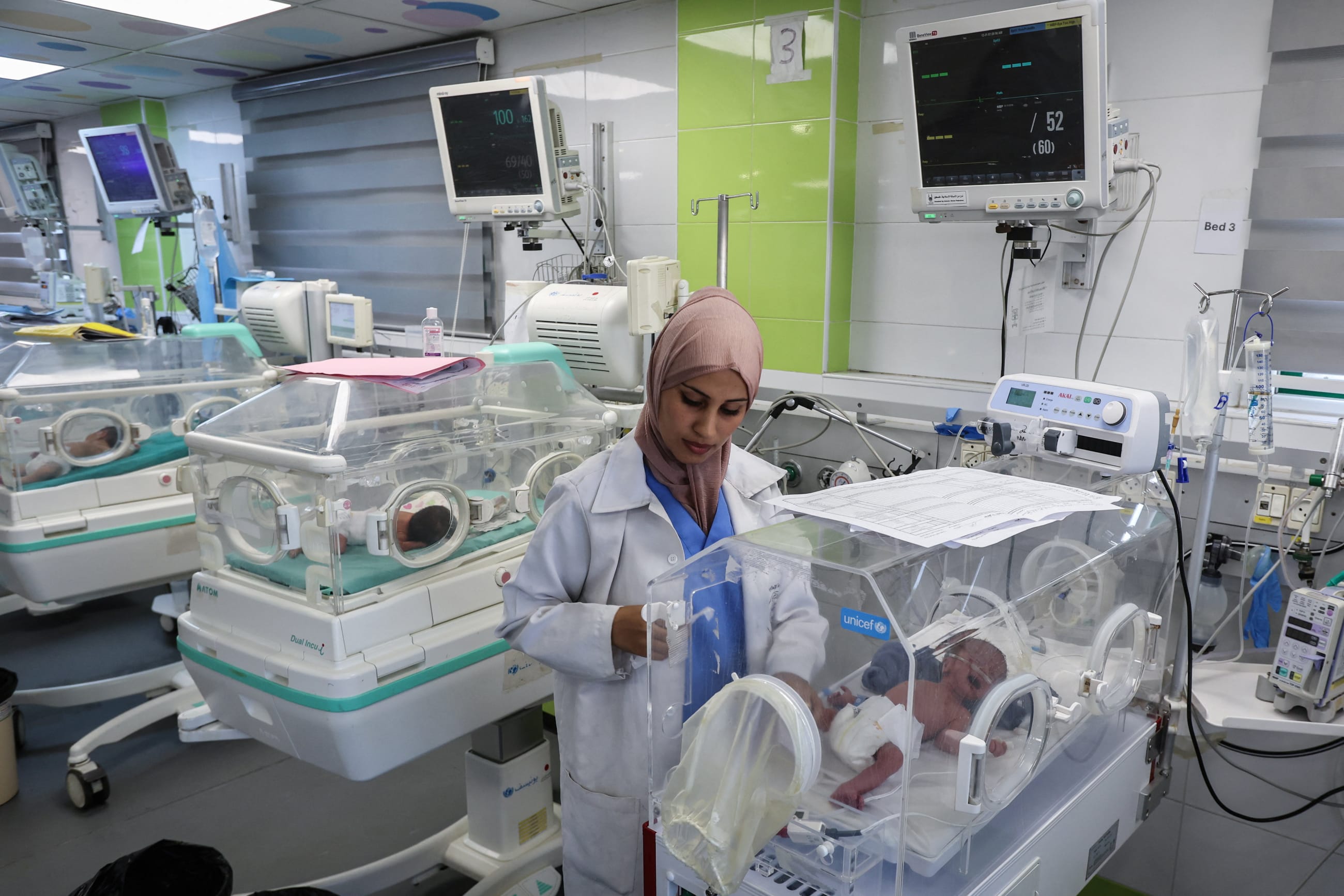 A nurse looks after a baby in an incubator at the maternity ward of Nasser hospital, in Khan Younis in the southern Gaza Strip, on September 25, 2025.