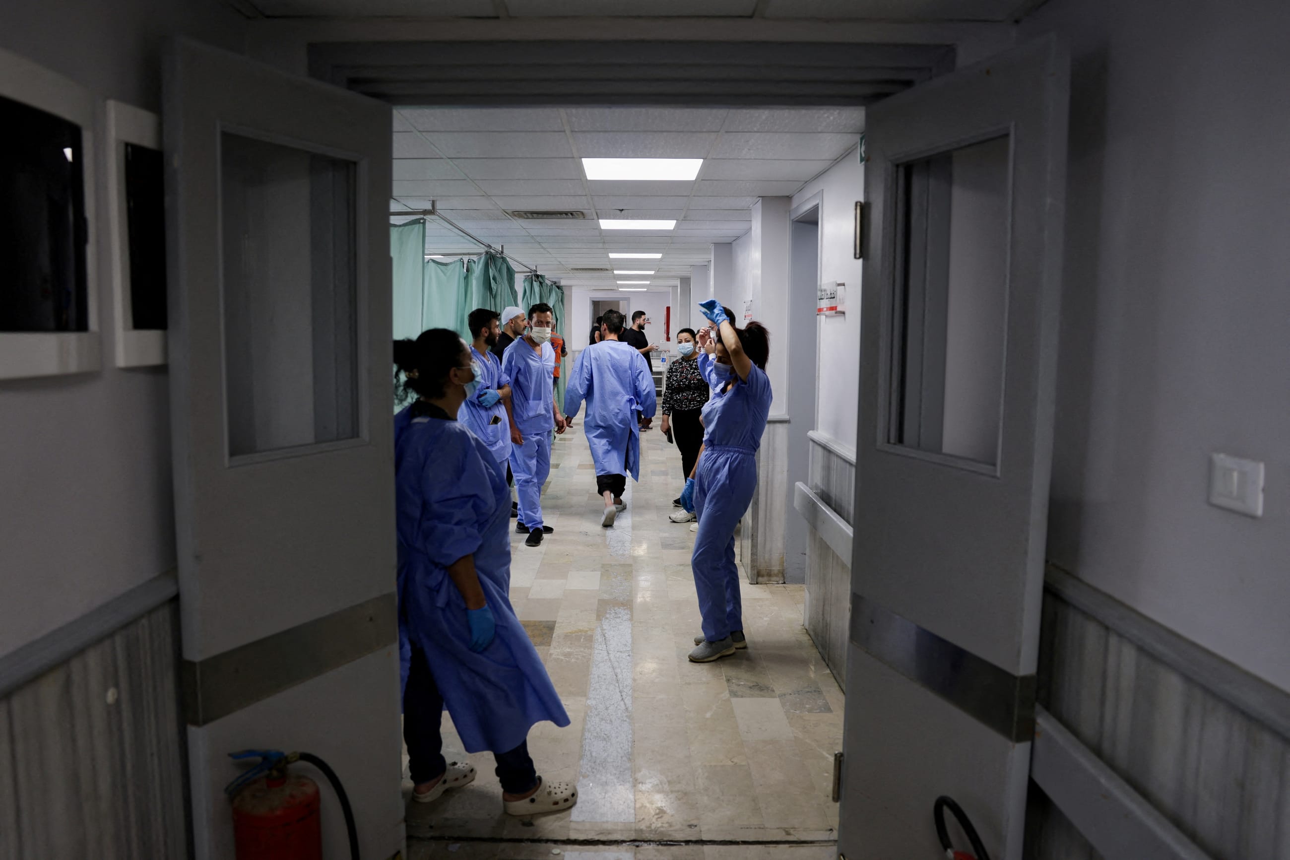 Medical personnel work at a hospital, following deadly clashes between Druze fighters, Sunni Bedouin tribes, and government forces, Sweida, Syria, on July 25, 2025.
