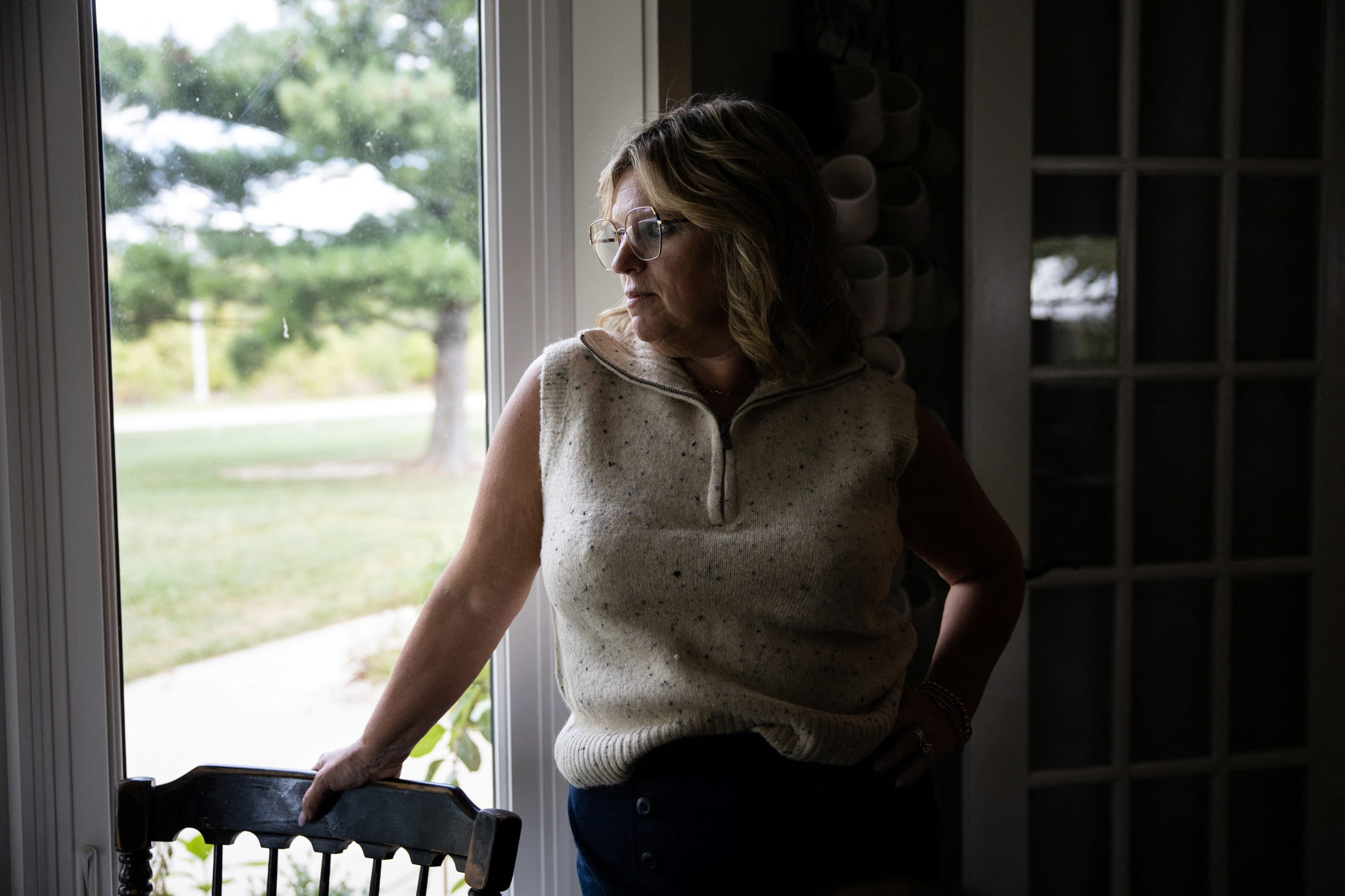 Dawn Heidlebaugh, who experienced mental health concerns while using Ozempic, looks out of the window of her home, in Findlay, Ohio, on September 19, 2023.