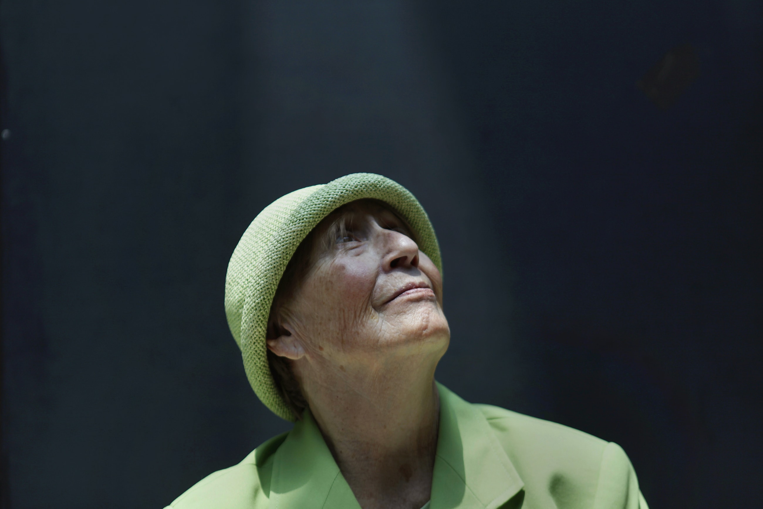 Teresa, 75, an Alzheimer's patient and former businesswoman, poses for a photograph inside the Alzheimer Foundation, in Mexico City, Mexico, on April 19, 2012.