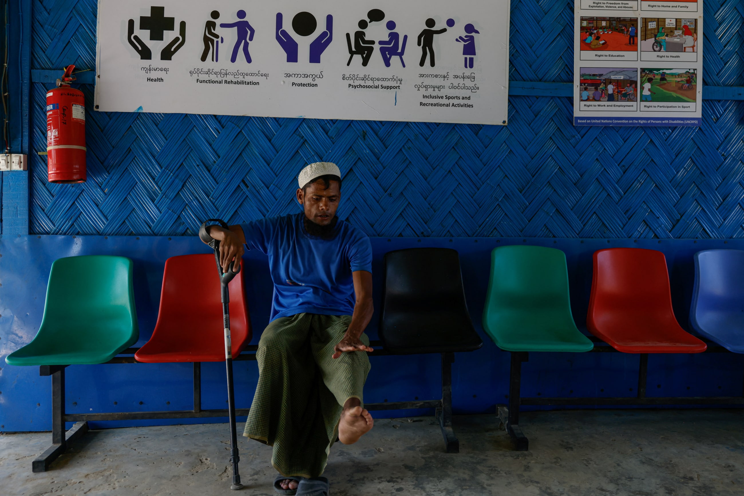 Shofiul Islam, 35, who has disabilities, shows his leg while visiting a facility funded by the U.S. Agency for International Development (USAID), for treatment, at the Rohingya refugee camp, in Cox's Bazar, Bangladesh, on March 16, 2025.