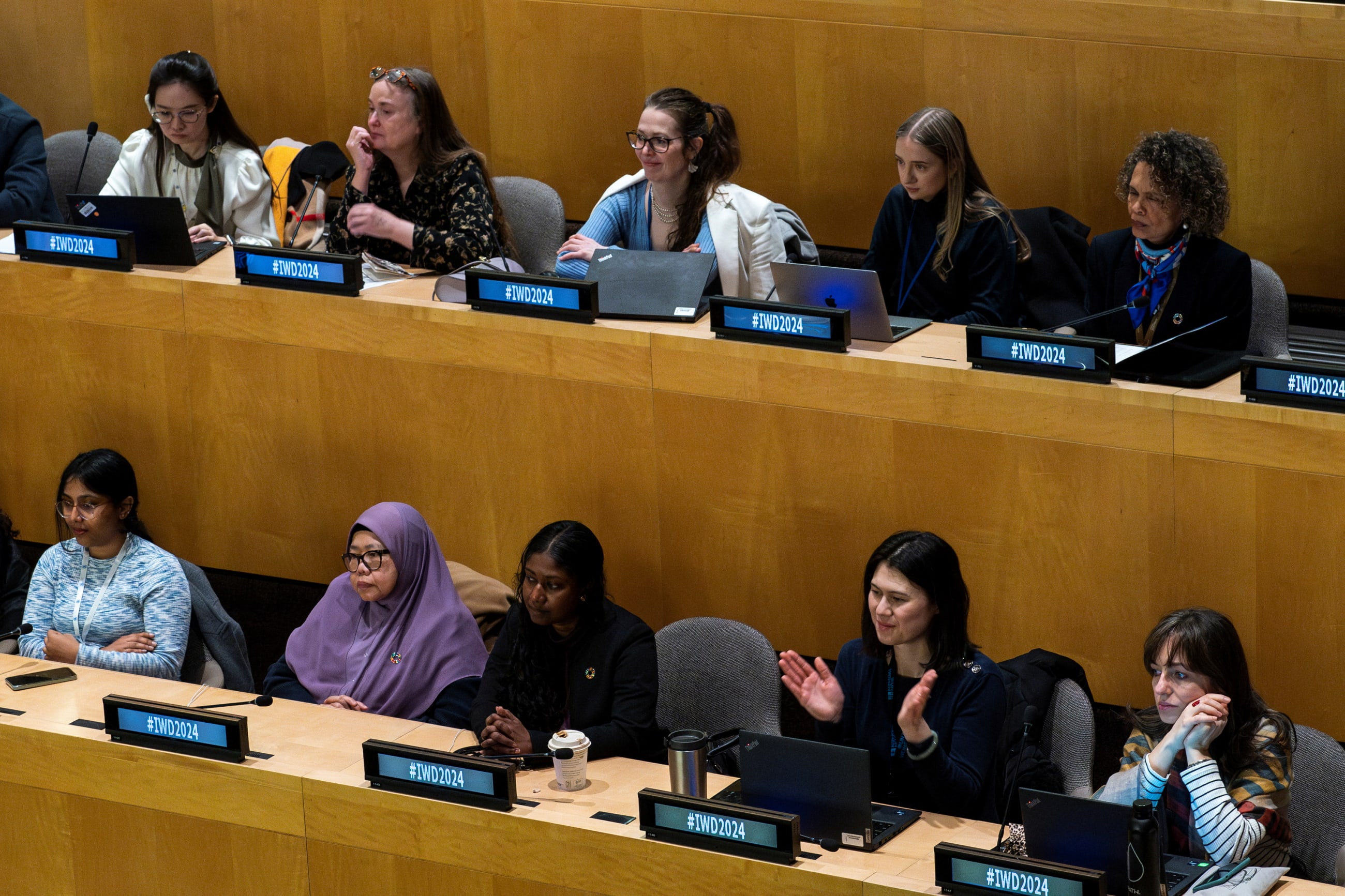 Women attend the observance of the International Women's Day 2024, at the United Nations in New York, on March 8, 2024.