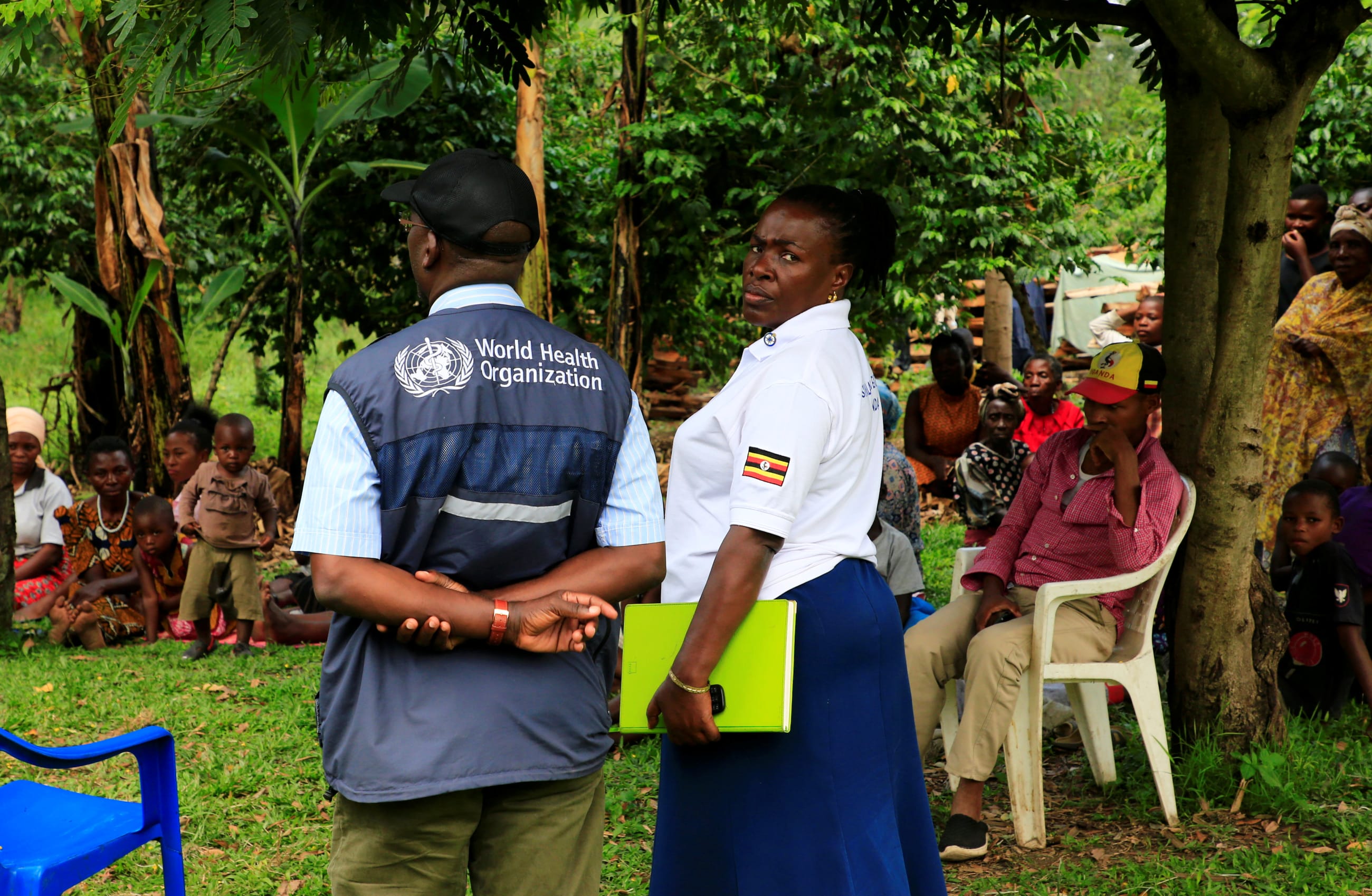 World Health Organization officials and Ugandan health workers inform the community of Kirembo village about the ebola vaccine, in Kasese district, Uganda, on June 15, 2019.