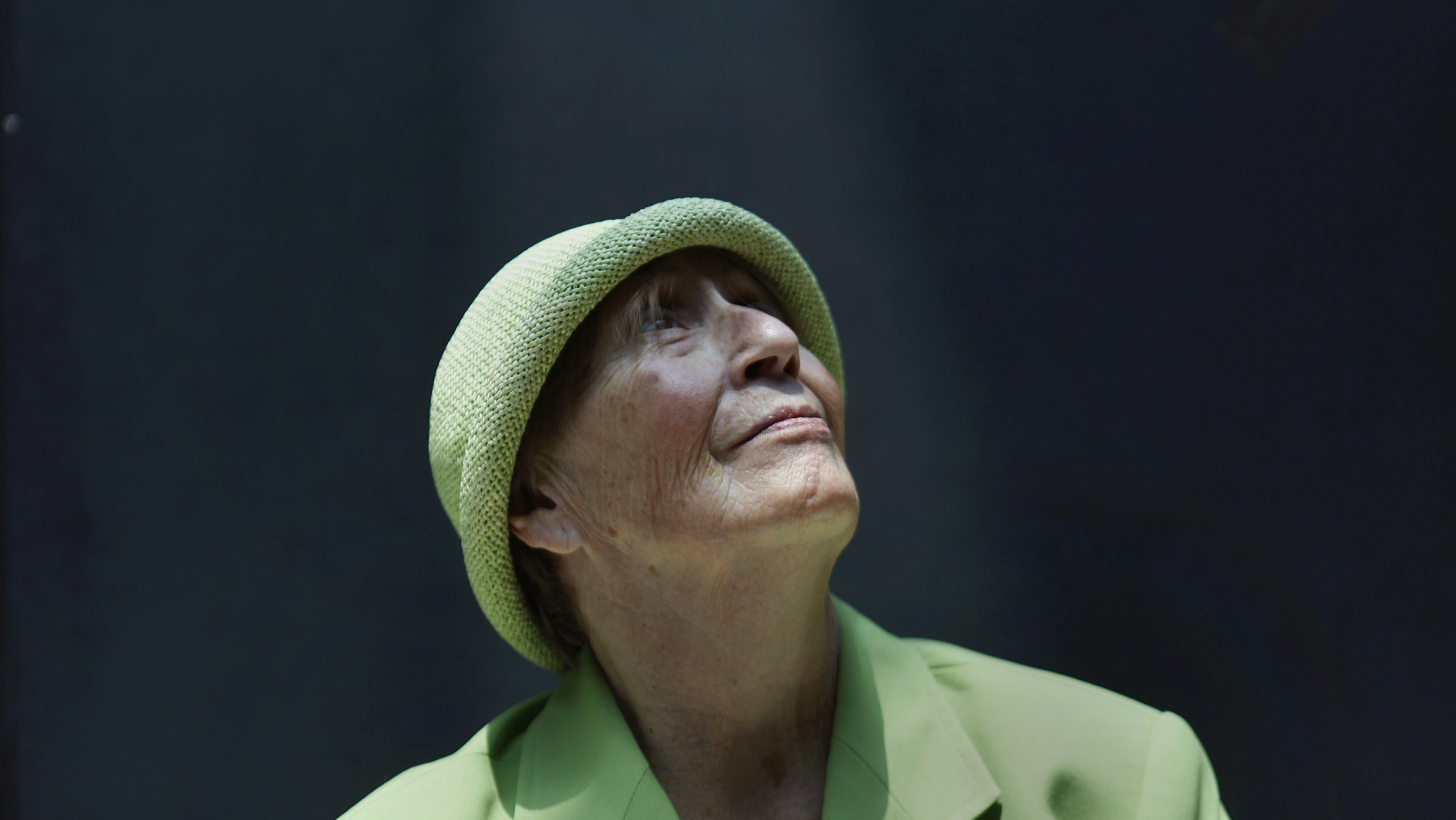 Teresa, 75, an Alzheimer's patient and former businesswoman, poses for a photograph inside the Alzheimer Foundation, in Mexico City, Mexico, on April 19, 2012.