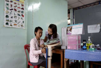 A refugee from Myanmar has her checkup done by a doctor at the Mae Tao clinic, in Mae Sot, Thailand, on October 30, 2015.