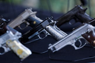 Guns that will be destroyed are displayed during an event for the International Day for the Destruction of Firearms, at the Basilica of Our Lady of Guadalupe, in Mexico City, Mexico, on July 9, 2025.