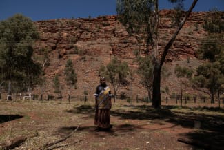 Teacher Tarna Andrews poses for a photo in the local school grounds, ahead of a nationwide referendum on Indigenous issues, in Areyonga, Australia, on September 15, 2023.