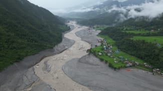Aerial view of flood-ravaged Betrawati in Rasuwa; many houses are buried beneath the mud, on August 29, 2026.