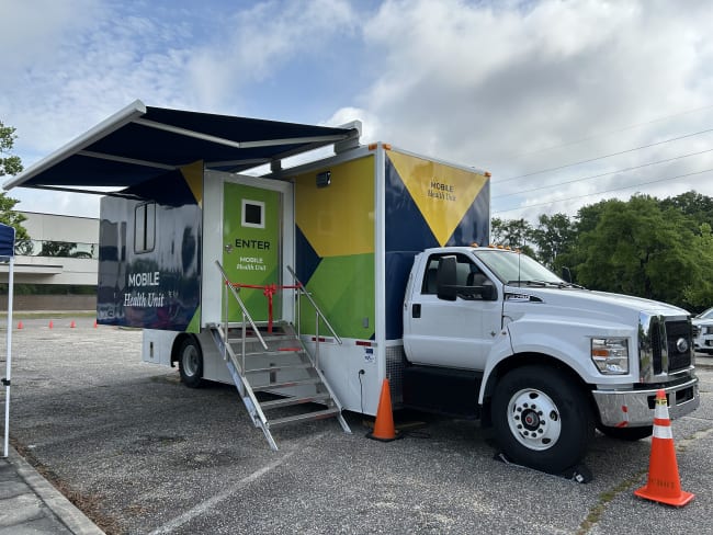 A mobile health clinic is seen during a ribbon cutting ceremony by the South Carolina Department of Public Health. The health truck administers measles, mumps, and rubella (MMR) vaccine at the Florence County Health Department, in Florence, South Carolina, on April 25, 2025.