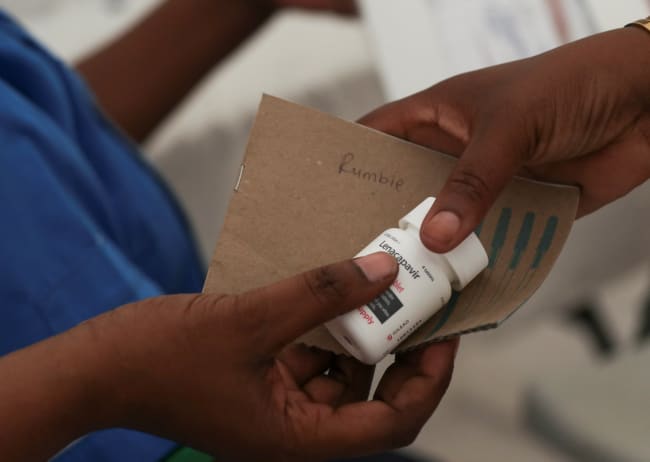 A health official holds Lenacapavir, a long‑acting HIV prevention treatment, in Epworth outside the capital Harare, Zimbabwe, February 19, 2026.REUTERS/Philimon Bulawayo