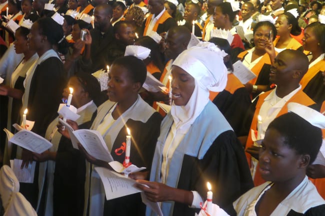 Malawi health care workers trained with PEPFAR funding attending a graduation ceremony in 2014. CDC image.