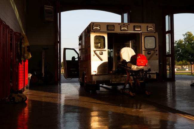 An ambulance is pictured as firefighters clean and restock medical supplies in ambulances and other emergency vehicles and equipment, Eagle Pass, Texas, on July 09, 2023.