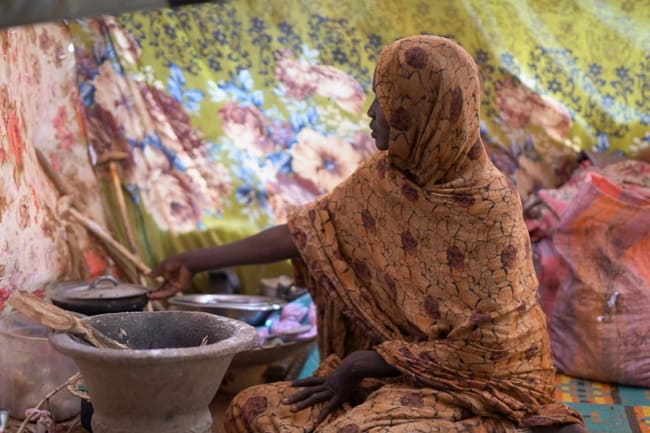A person who contracted HIV after losing access to PrEP, washes his face, in Asaba, Delta State, Nigeria, on May 31, 2025.