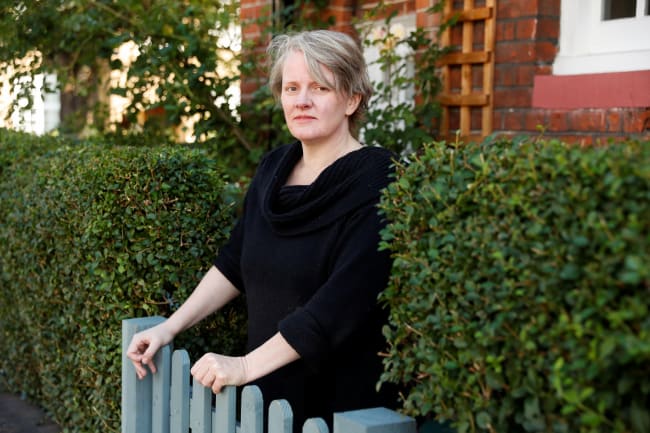 Felicity Callard, a 49-year-old British university professor and lecturer who continues to struggle with symptoms following a COVID-19 infection, poses after an interview at her house, in London, Britain, on September 2, 2020.