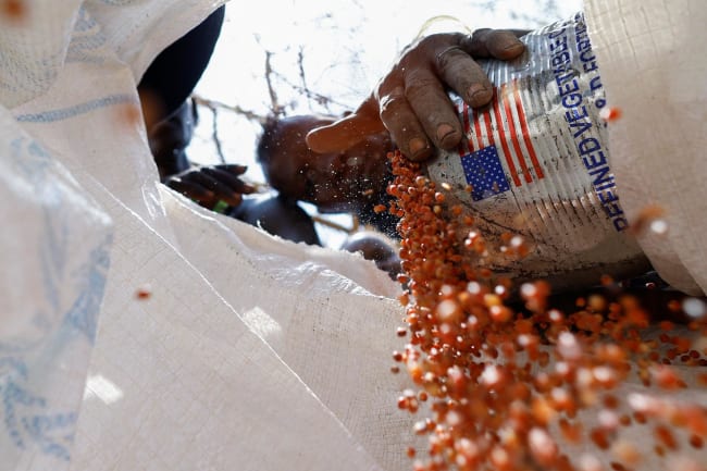 A person who contracted HIV after losing access to PrEP, washes his face, in Asaba, Delta State, Nigeria, on May 31, 2025.