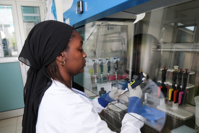 Seynabou Diop works at a station in a laboratory where the hantavirus genome was sequenced at Institut Pasteur, in Dakar, Senegal, on May 19, 2026.