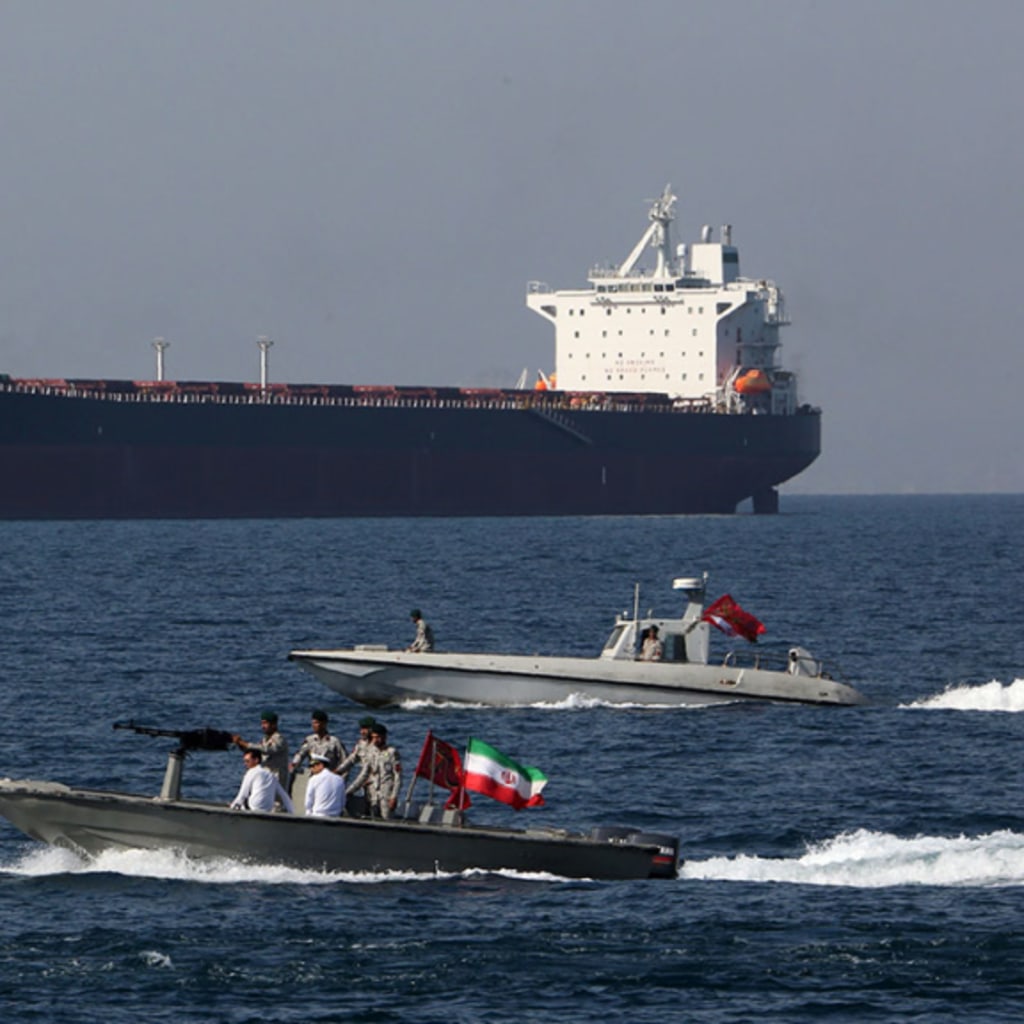 <p>Iranian sailors take part in the National Persian Gulf Day in the Strait of Hormuz.</p>
