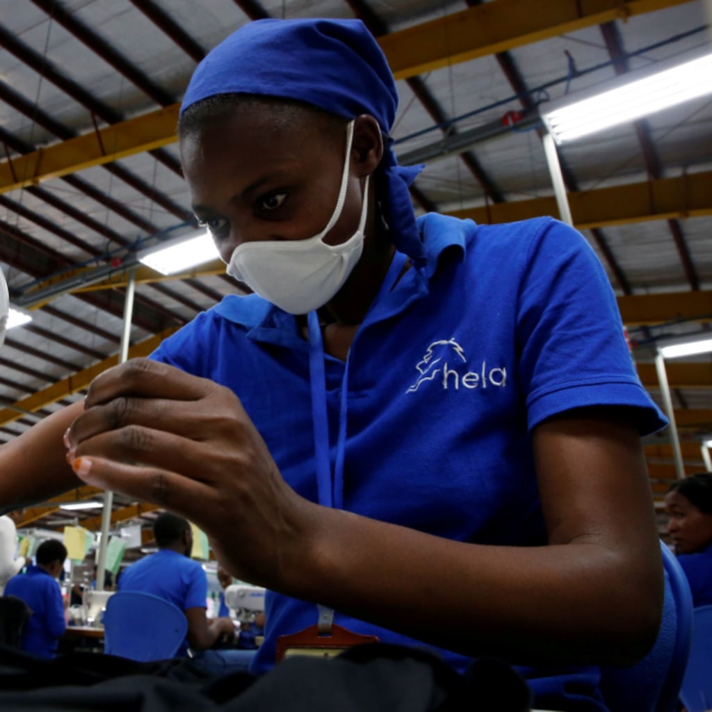<p>A worker sews at an export processing zone factory in Athi River, Kenya.</p>
