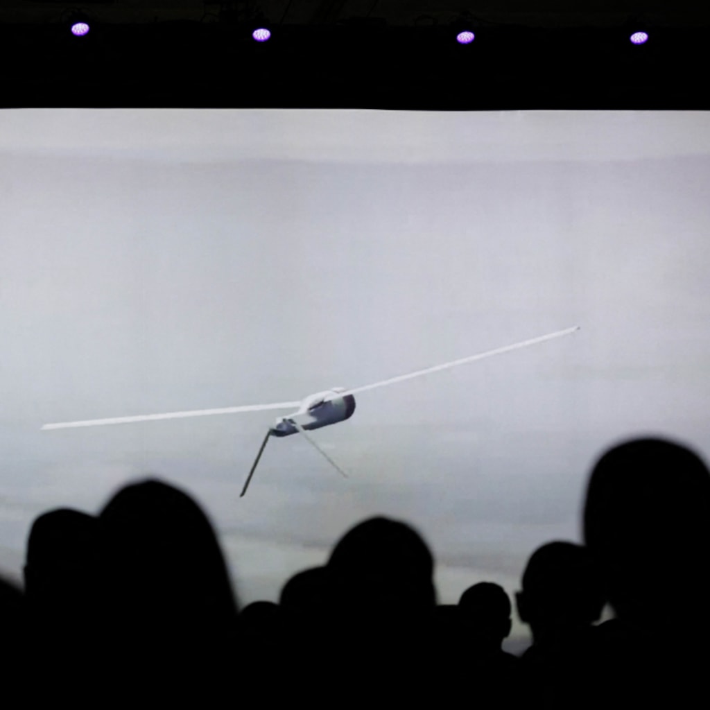 <p>Attendees at the Xponential 2024 show, a technology event for autonomous systems held in San Diego, view a video showing a drone in flight. April 23, 2024.</p>
