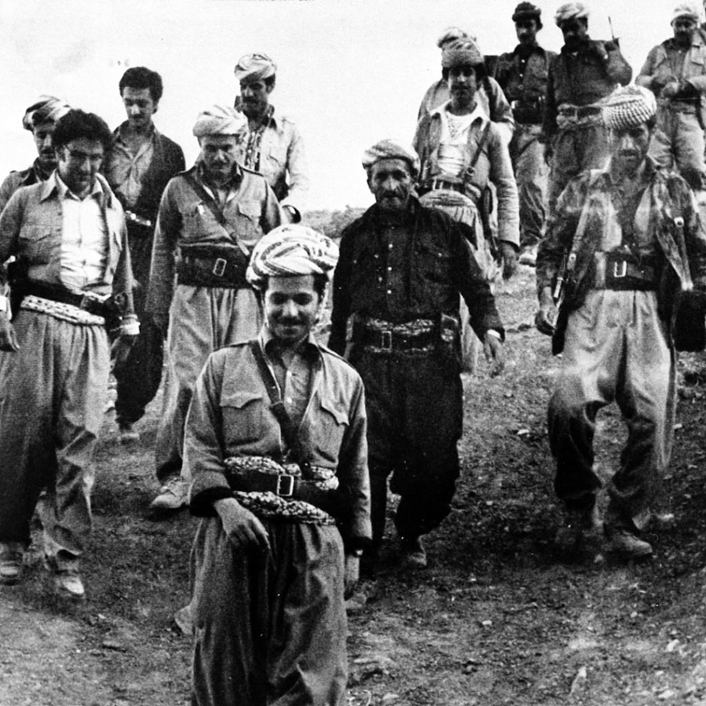 Mustafa Barzani and his son, Masoud Barzani, cross the Iranian border into Iraq in July 1979. 
