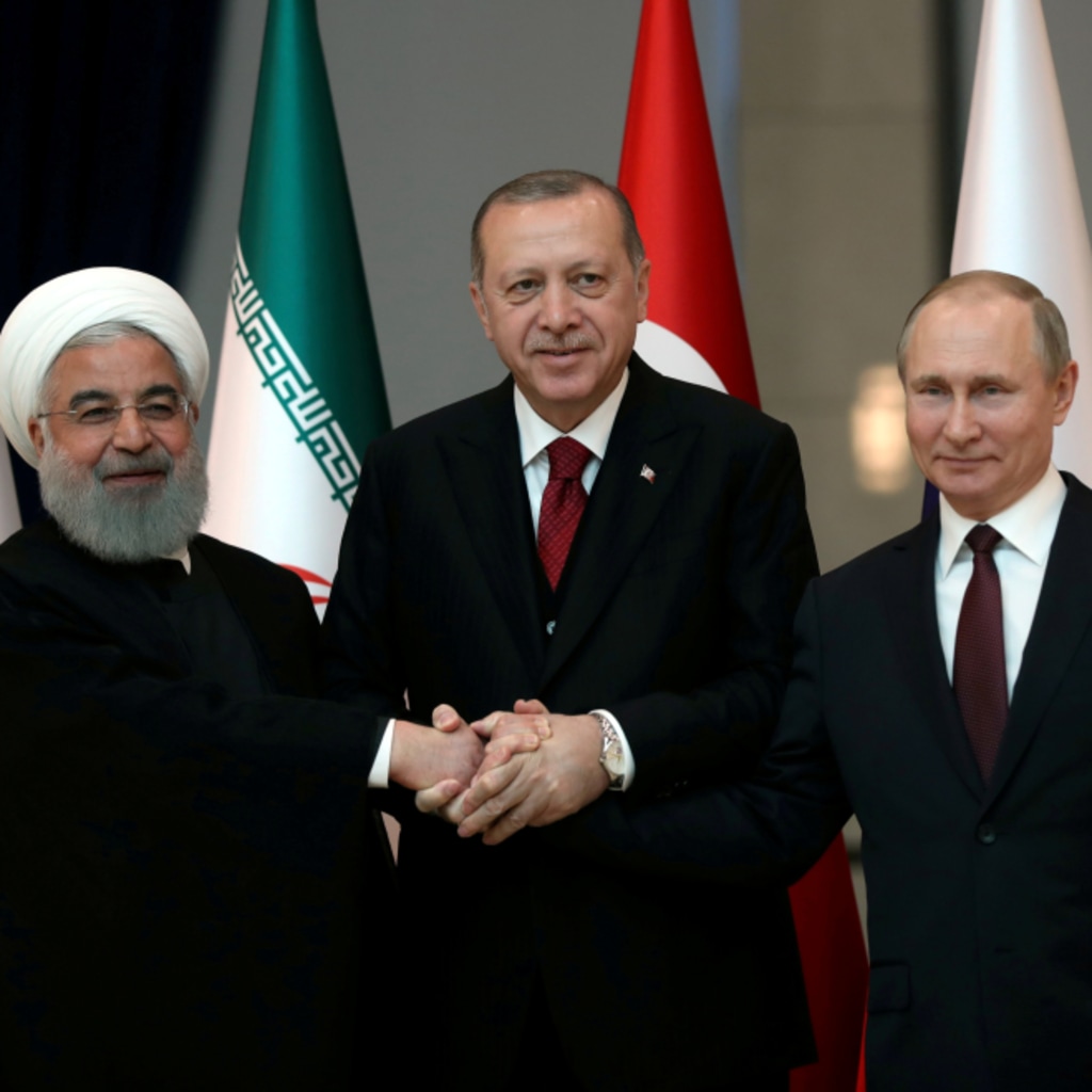 <p>Presidents Hassan Rouhani of Iran, Tayyip Erdogan of Turkey and Vladimir Putin of Russia pose before their meeting in Ankara, Turkey April 4, 2018. </p>
