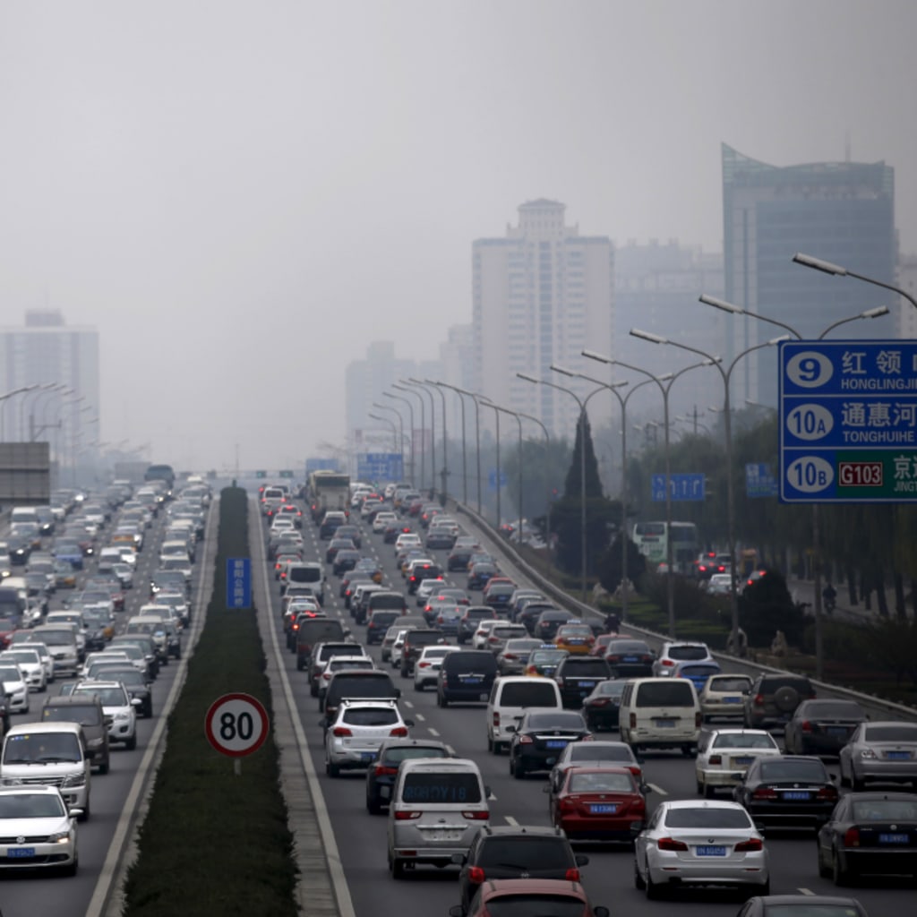<p>A view of traffic during a hazy day in Beijing, China, November 18, 2015. Some global automakers are worried that China is pushing its weight around as the world’s biggest car market – by enforcing its own, often outdated, vehicle certification standards </p>
