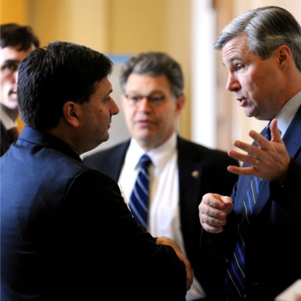 <p>U.S. Senator Sheldon Whitehouse (D-RI) (R) talks to Ron Klain (L), Chief of Staff for U.S. Vice President Joe Biden, outside of the senate Democrats’ weekly policy lunch at the U.S. Capitol in Washington on December 8, 2009. </p>

