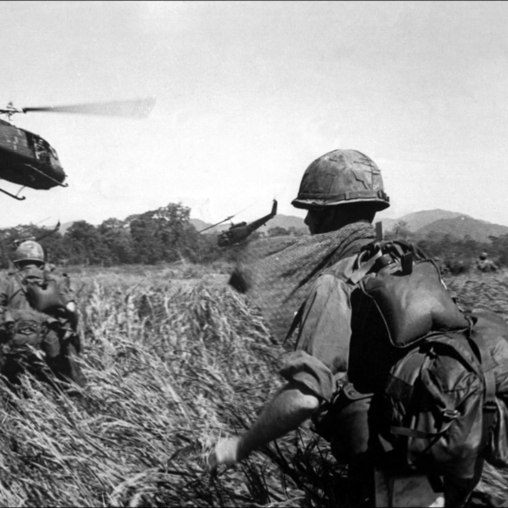 American soldiers of the 173th airborne are evacuated by helicopter from a Vietcong position, December 11, 1965.