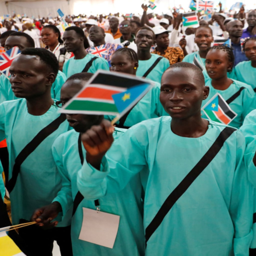 <p>Internally displaced persons react as Pope Francis arrives to meet them at the Freedom Hall during his apostolic journey, in Juba, South Sudan, February 4, 2023.</p>
