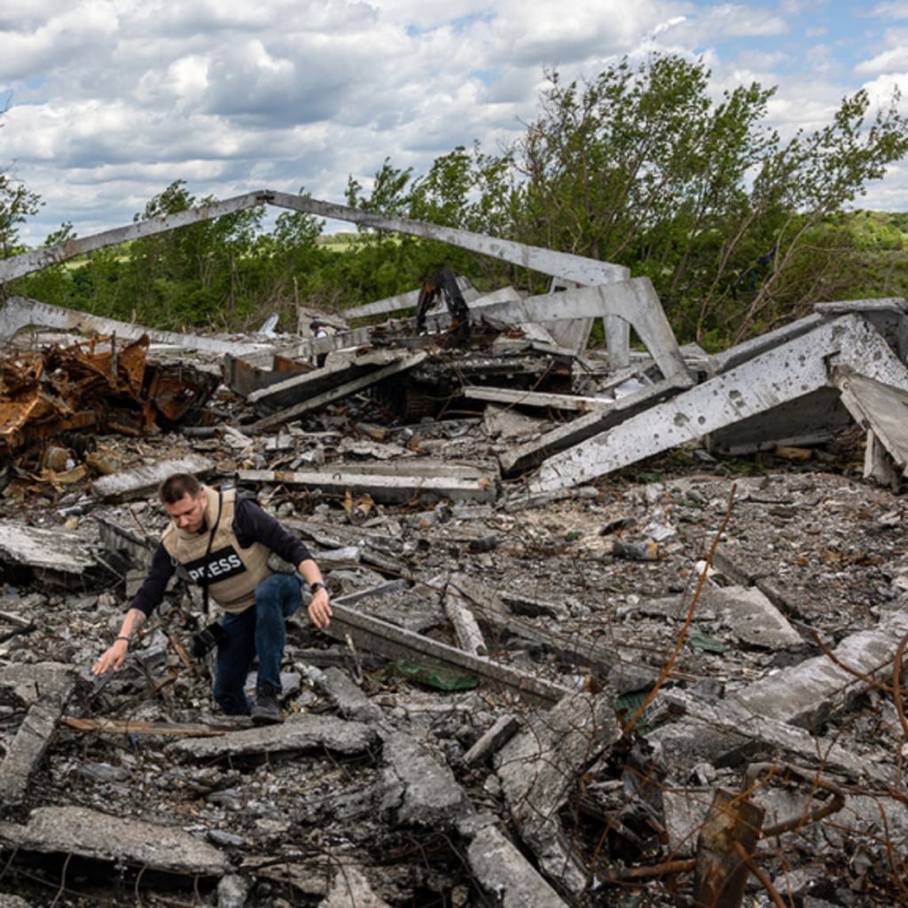 Covering the War in Ukraine: The View From Journalists