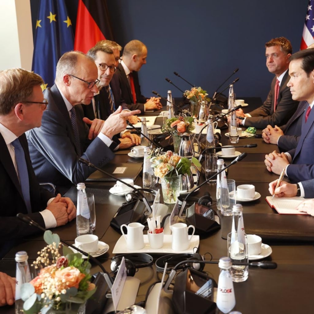 German Chancellor Friedrich Merz (2nd from L) gestures to U.S. Secretary of State Marco Rubio (2nd from R) as German Foreign Minister Johann Wadephul (L) looks on during a bilateral meeting at the 62nd Munich Security Conference on February 13, 2026 in Munich, Germany.