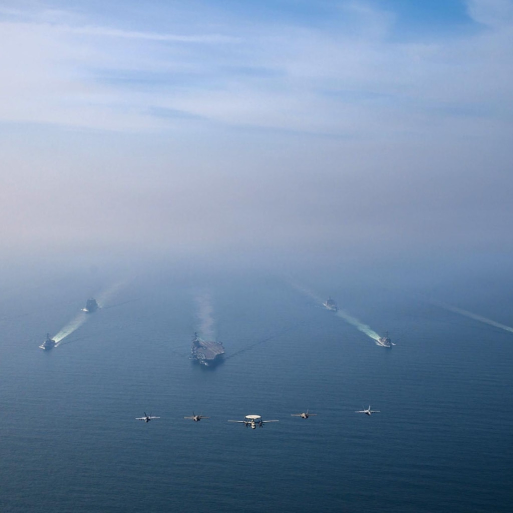 <p>The U.S. Navy’s Nimitz-class aircraft carrier USS <em>Abraham Lincoln</em> leads its strike group during a photo exercise in the Arabian Sea, February 6, 2026.</p>