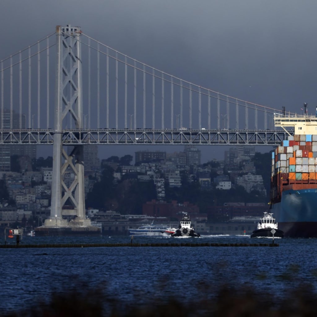 A container ship pulls into the Port of Oakland on August 01, 2025 in Oakland, California.