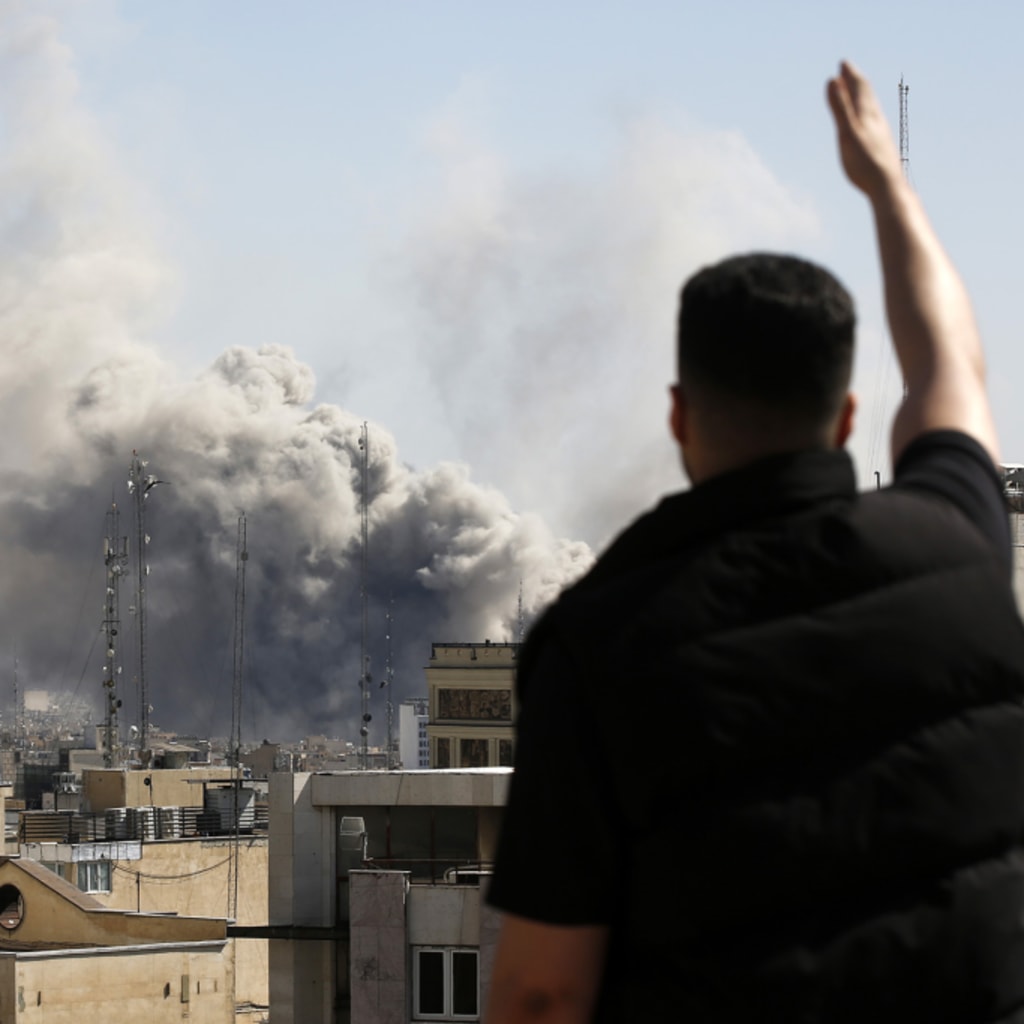 Plumes of smoke rise over the residential areas of the Iranian capital following airstrikes amid ongoing U.S.–Israel attacks as multiple explosions are heard across the city in Tehran.