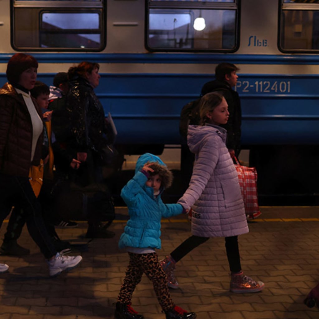 Ukrainian Refugees Fleeing West