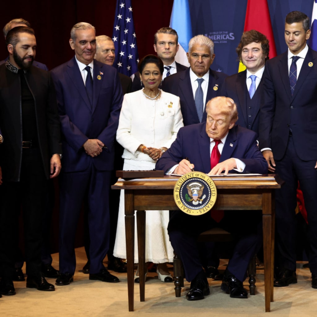 <p>U.S. President Donald Trump signs the “Commitment to countering cartel criminal activity” document during the “Shield of the Americas” Summit in Miami, Florida, U.S., March 7, 2026.</p>
